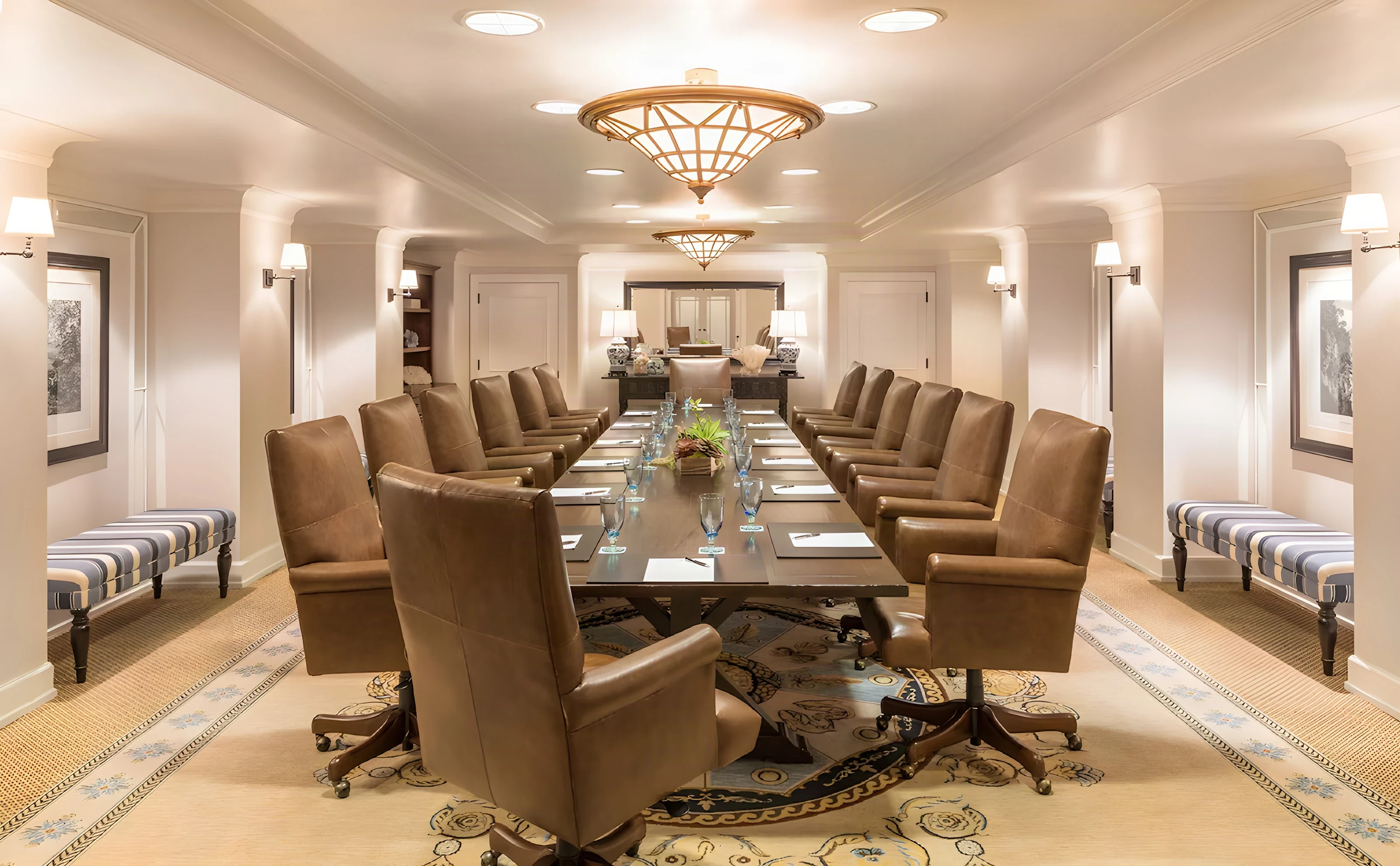 Casa del Mar boardroom with a long timber table and leather chairs
