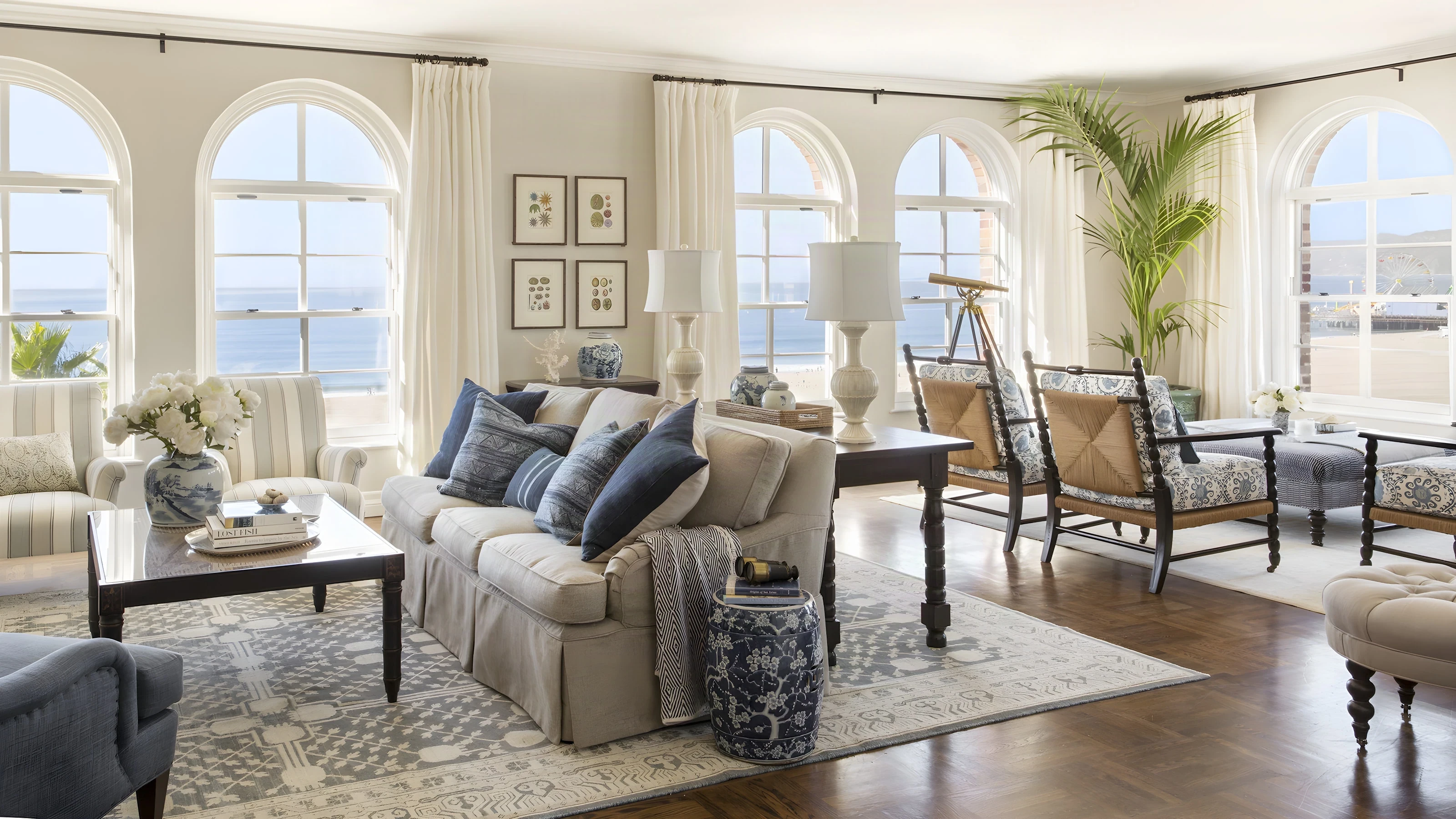 Renovated Casa del Mar suite living room with blue-and-white textiles and ocean views