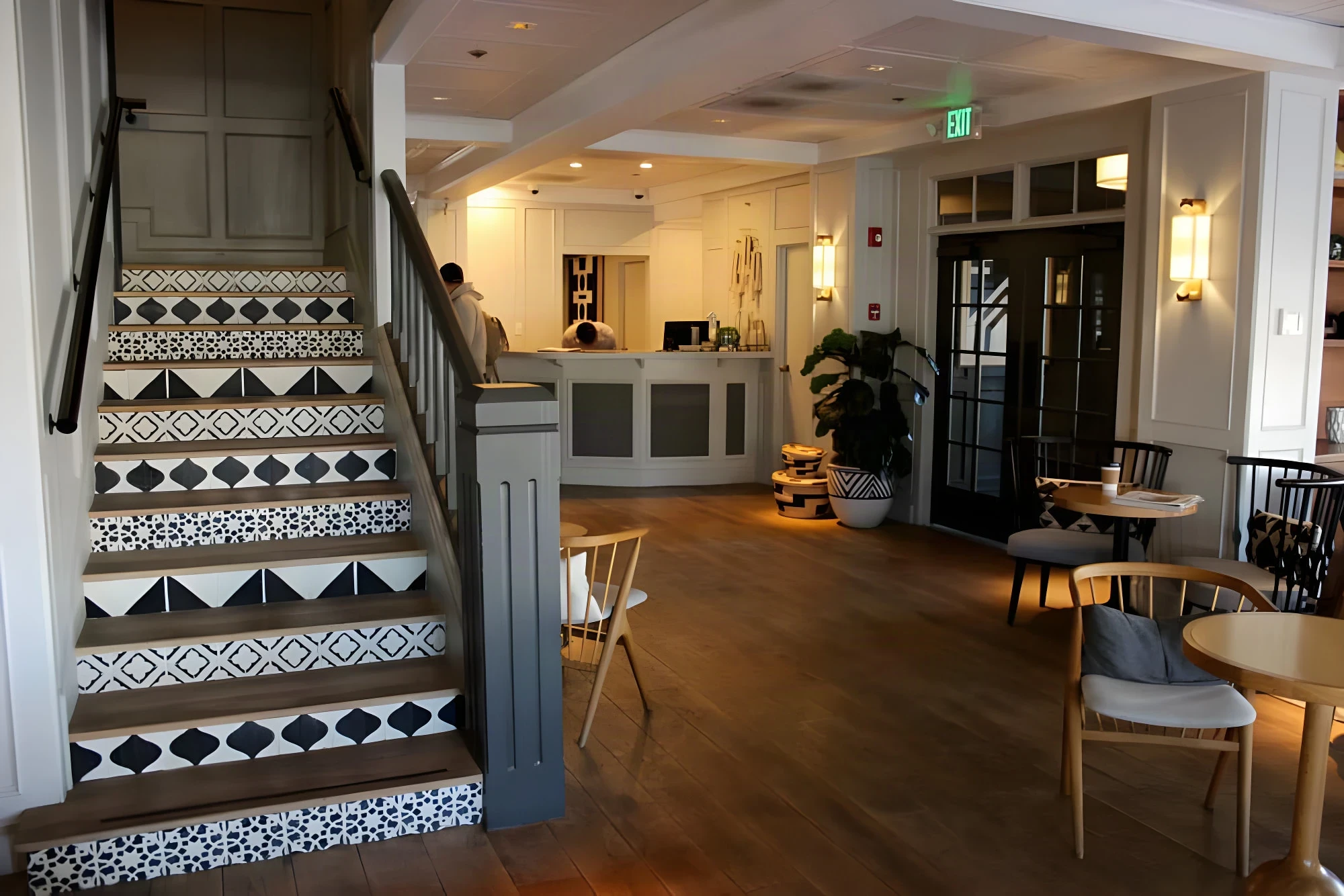 Stair with black and white patterned risers beside the lobby café at The Landsby